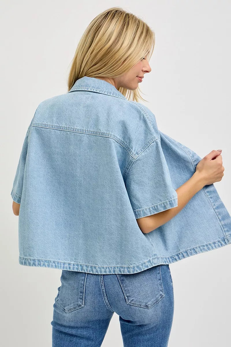 Light blue RISEN oversized half-sleeve cropped shirt by Trendsi, featuring a relaxed fit and casual style, shown on a mannequin.