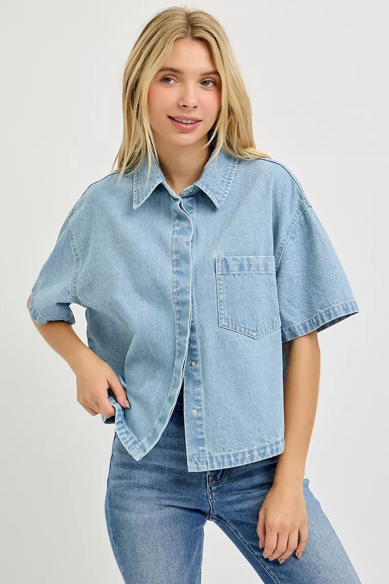 Light blue RISEN oversized half-sleeve cropped shirt from Trendsi, relaxed fit with a casual, trendy look.