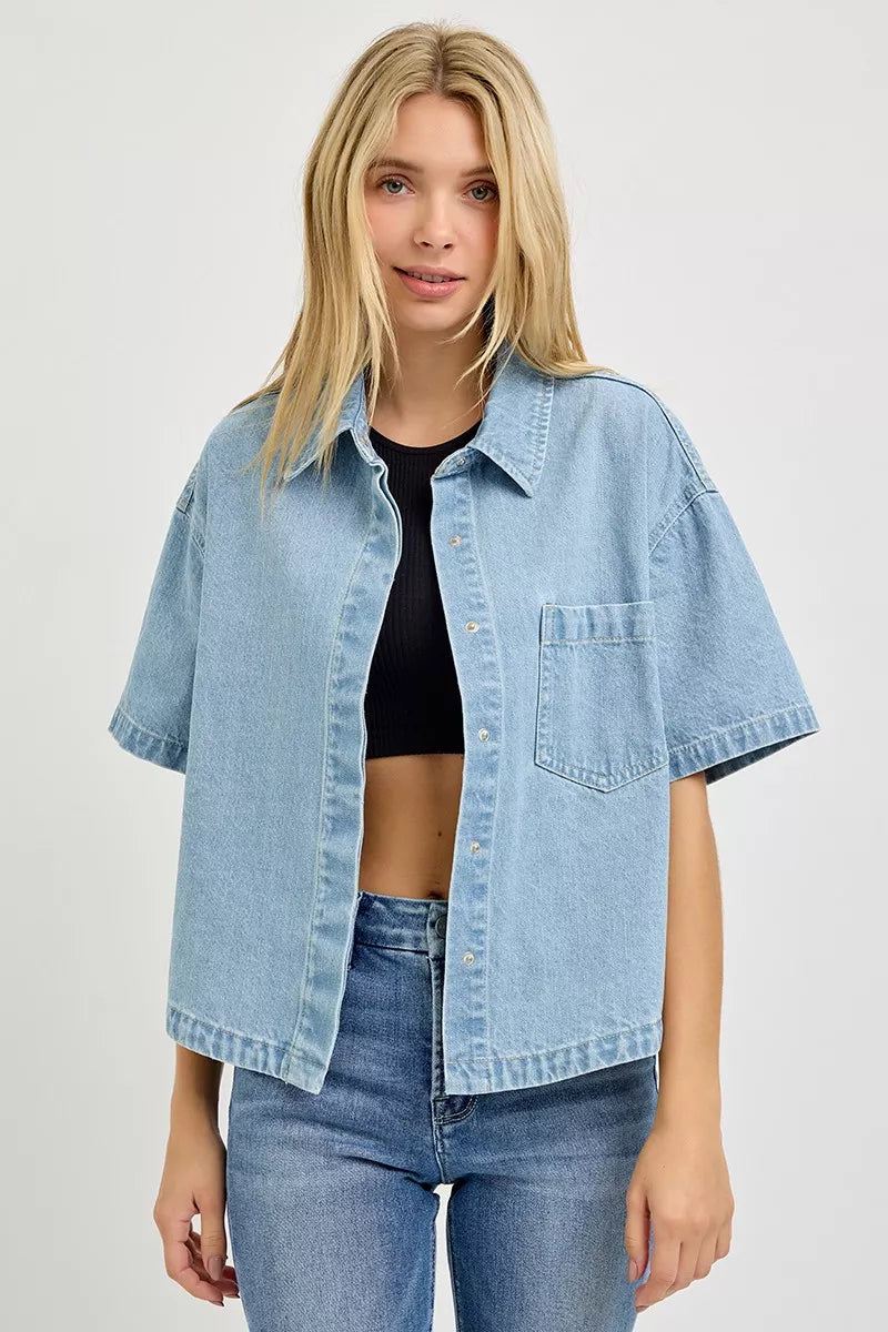 Light gray oversized half-sleeve cropped shirt by RISEN, styled casually with a relaxed fit and modern design.