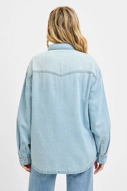 Light blue Risen Western Yoke Style relaxed fit denim shirt with button-up front and long sleeves, casual western-inspired design.