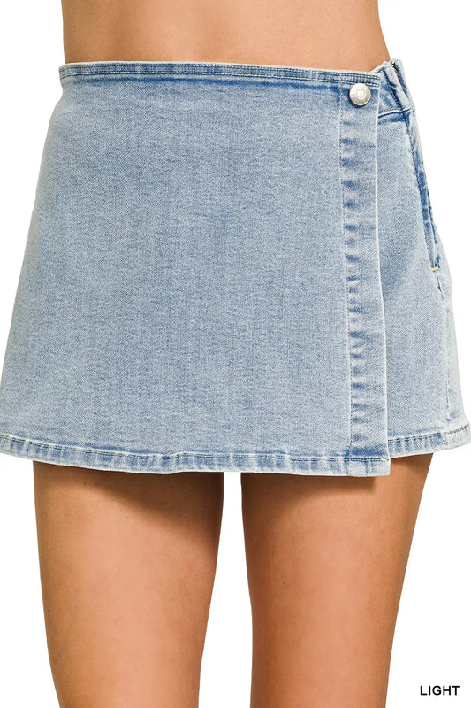 Light blue denim skort with wrap front design by Zenana, featuring a casual, stylish look perfect for warm-weather outfits.