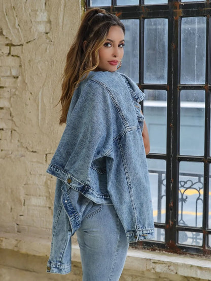 Light blue button-down denim jacket with drop shoulder design from Trendsi, featuring classic style and relaxed fit.