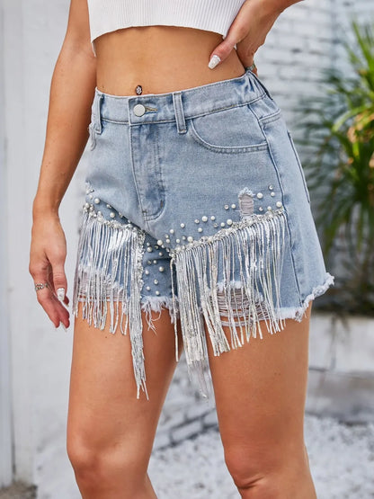 Light blue distressed pearl trim denim shorts with front and back pockets, casual trendy shorts by Trendsi.