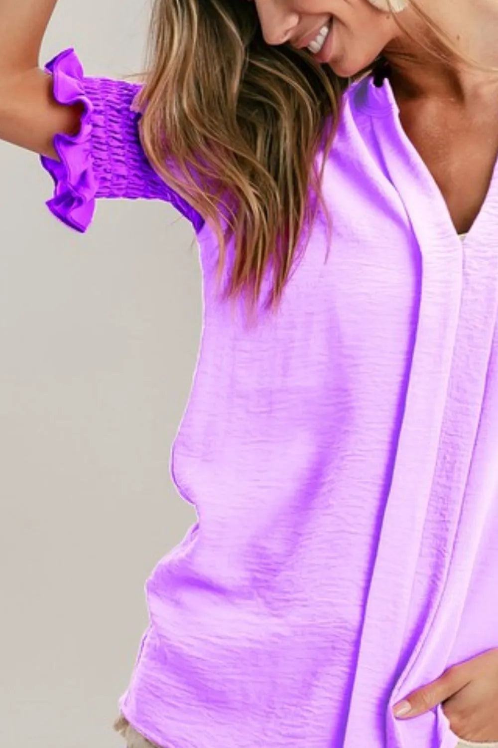 Lilac dusty lavender BiBi Air Flow color block puff sleeve V-neck top by Trendsi, featuring a relaxed fit and stylish design.