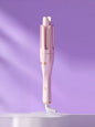 Automatic rotating hair curling iron by Trendsi with lilac finish and European plug, designed for easy, effortless curls.