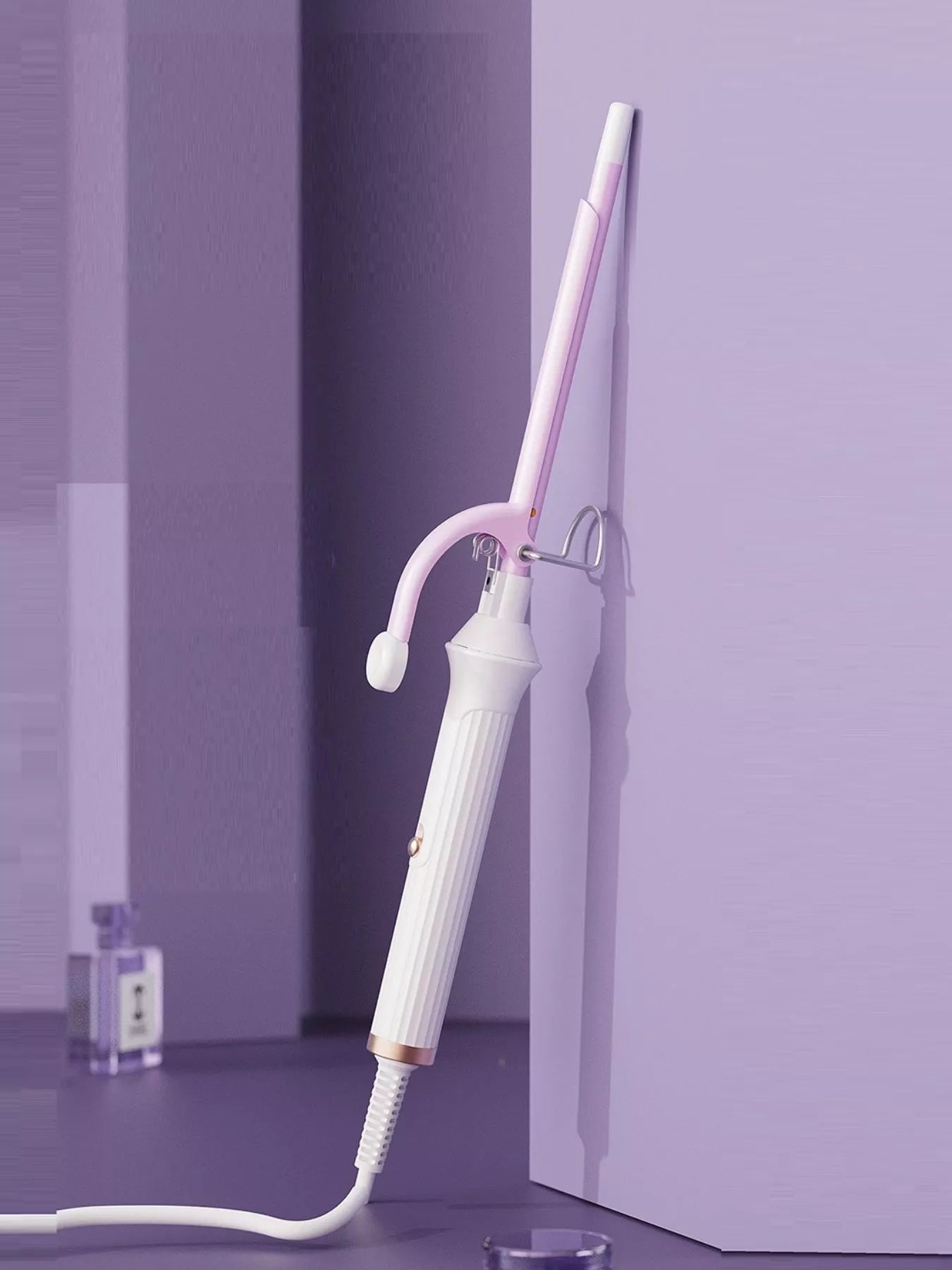 Trendsi fast heating ceramic hair curling iron with lilac finish and European plug, designed for creating curly hairstyles.