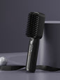 Lilac portable heated straightening comb from Trendsi with a sleek design, perfect for quick hair styling on the go.