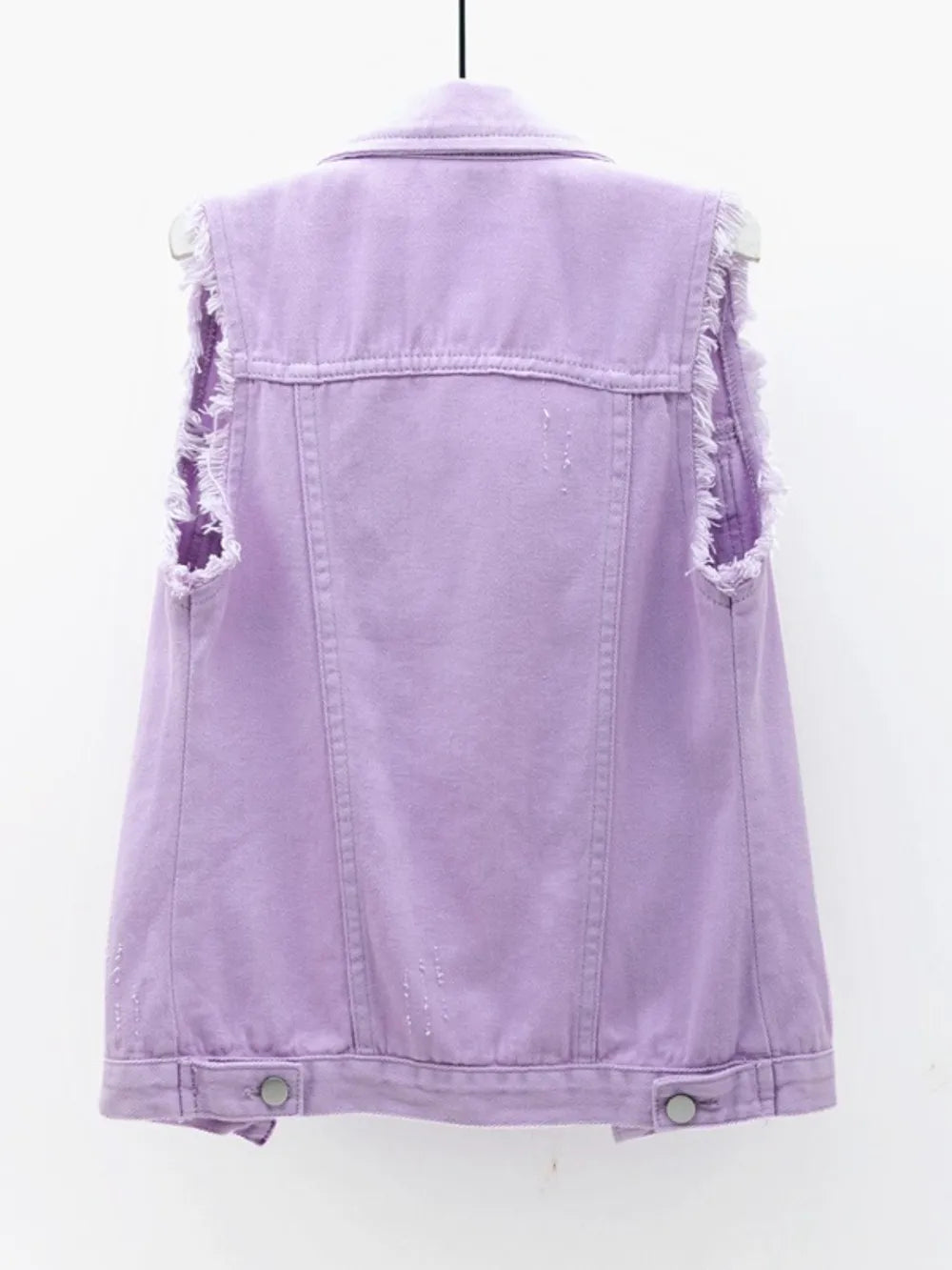Plus size lilac sleeveless denim jacket with button-down front and raw hem, from Trendsi, shown on a model.