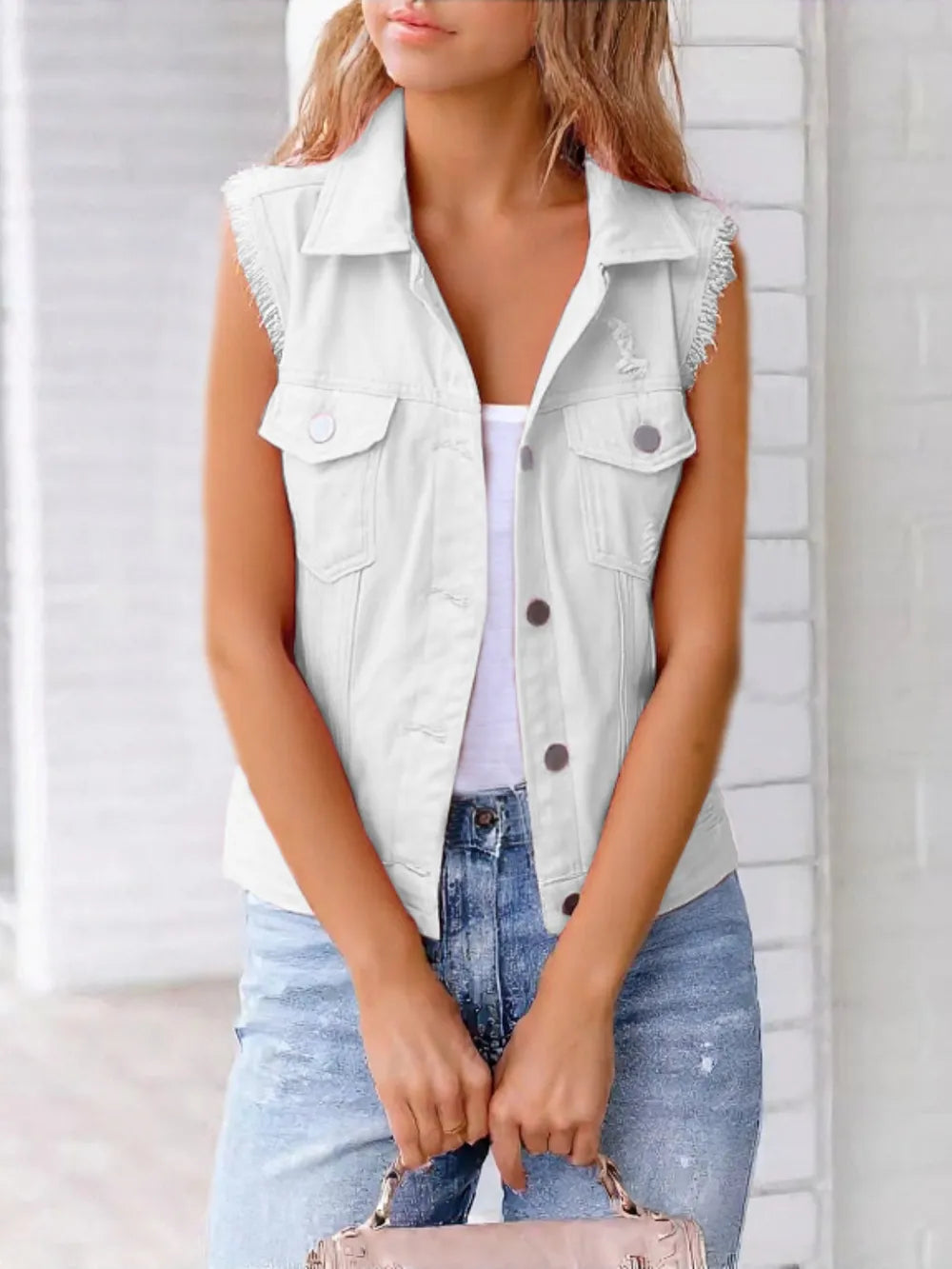 Plus size lilac sleeveless denim jacket with full size button-down front and raw hem, stylish Trendsi denim outerwear.