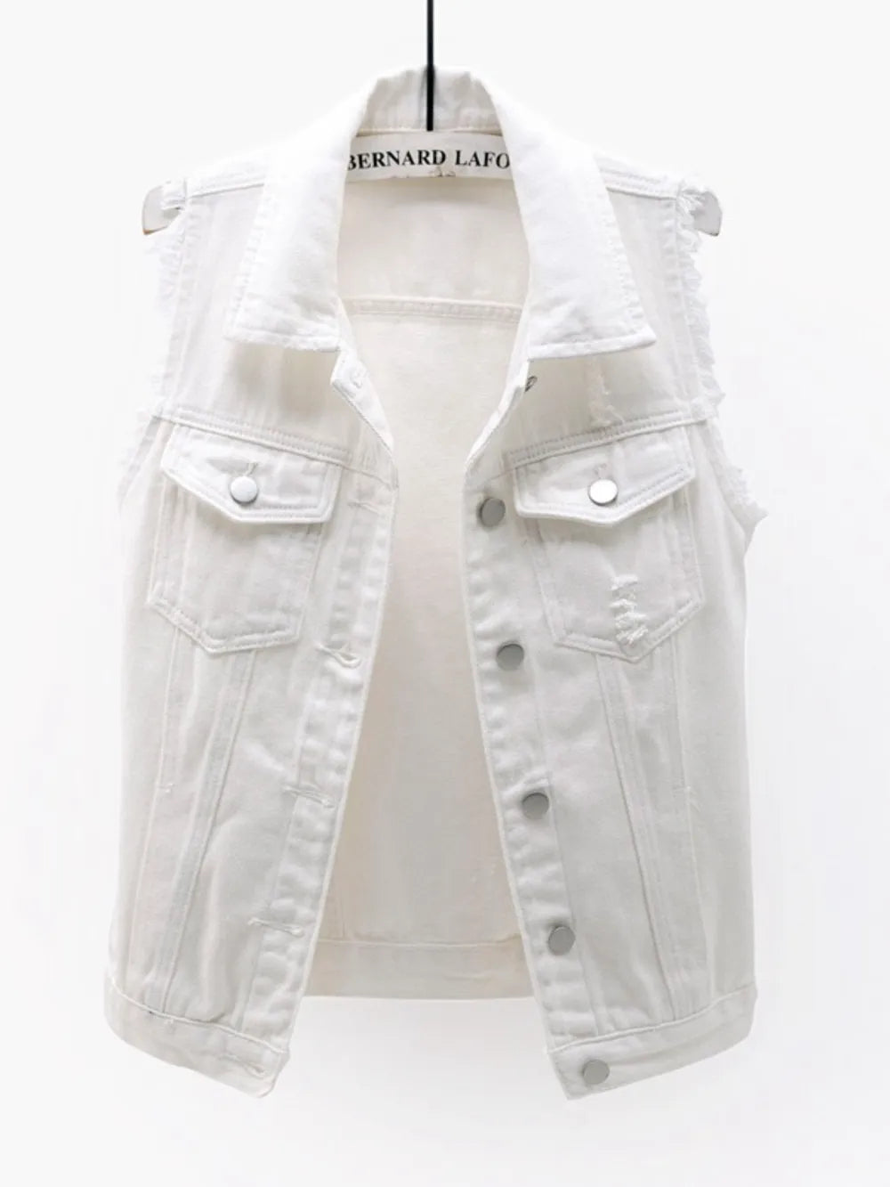 Plus size sleeveless denim jacket from Trendsi with full size button-down style and raw hem, in a lilac color.
