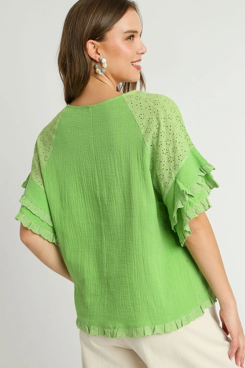 Plus size Umgee cotton gauze blouse with round neck, ruffle eyelet details, layered sleeves, in lime color.