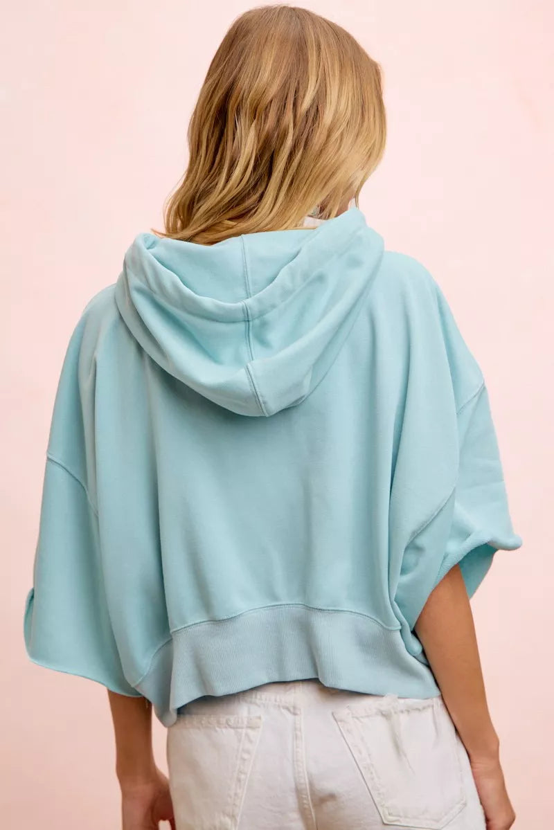 Light blue BiBi washed terry short sleeve drawstring hoodie top by Trendsi, featuring a relaxed fit and casual style.