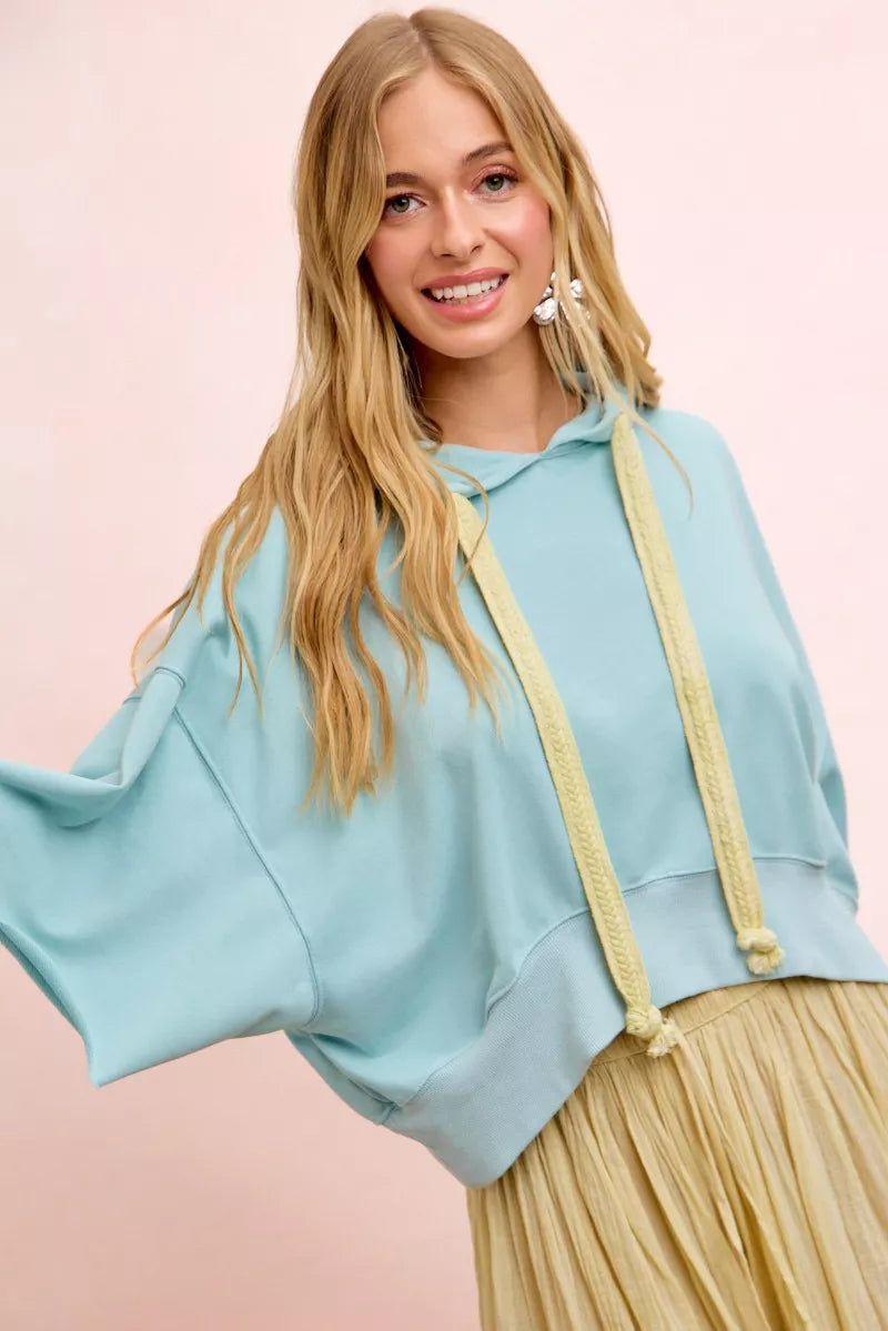 Light blue BiBi washed terry short sleeve hoodie top with drawstring front, casual and comfortable for everyday wear.