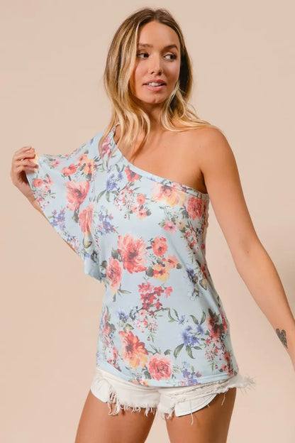 Blue floral printed jersey knit ruffle sleeve top by Trendsi, featuring a stylish and comfortable design with ruffled sleeves.