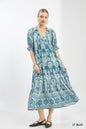 Light blue Umgee two-tone border print midi dress with a flowy silhouette and stylish design, perfect for casual or semi-formal wear.