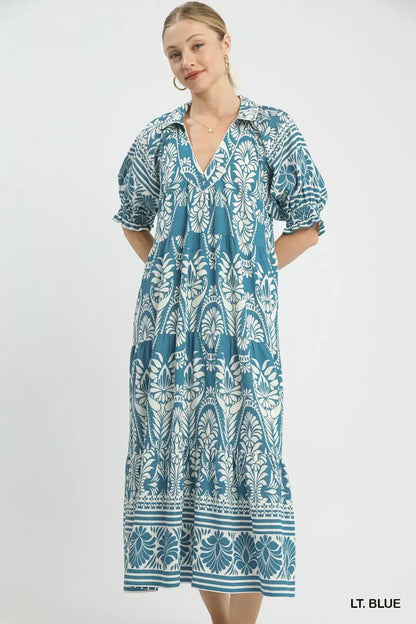 Light blue Umgee two-tone border print midi dress with a flowing silhouette, featuring a stylish and casual design.