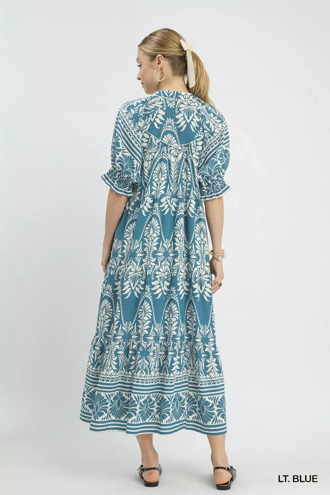 Blue and white two-tone border print midi dress by Umgee, featuring a flowy silhouette and stylish design.