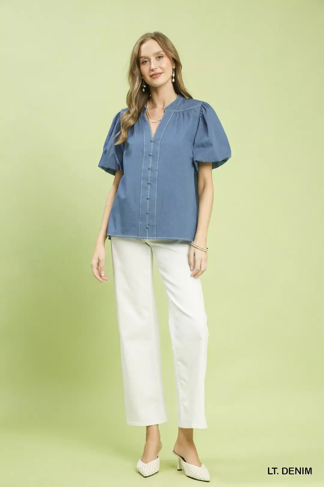Blue denim Umgee boho blouse with button front and puff sleeves, featuring a relaxed, stylish fit.