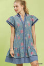 Umgee floral contrast trim ruffle hem mini dress with short sleeves, featuring a stylish pattern and feminine ruffle details.