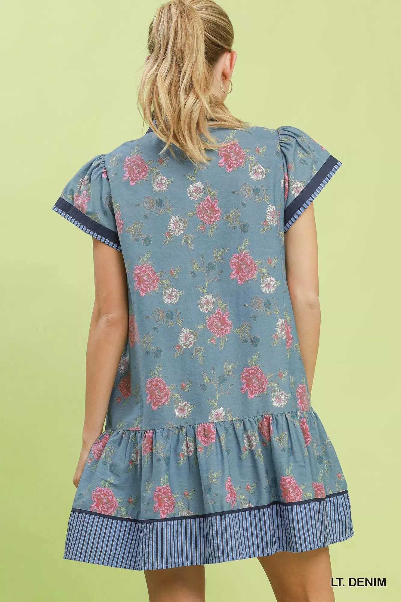 Umgee floral contrast trim ruffle hem mini dress featuring a stylish pattern and feminine design, perfect for casual or semi-formal wear.