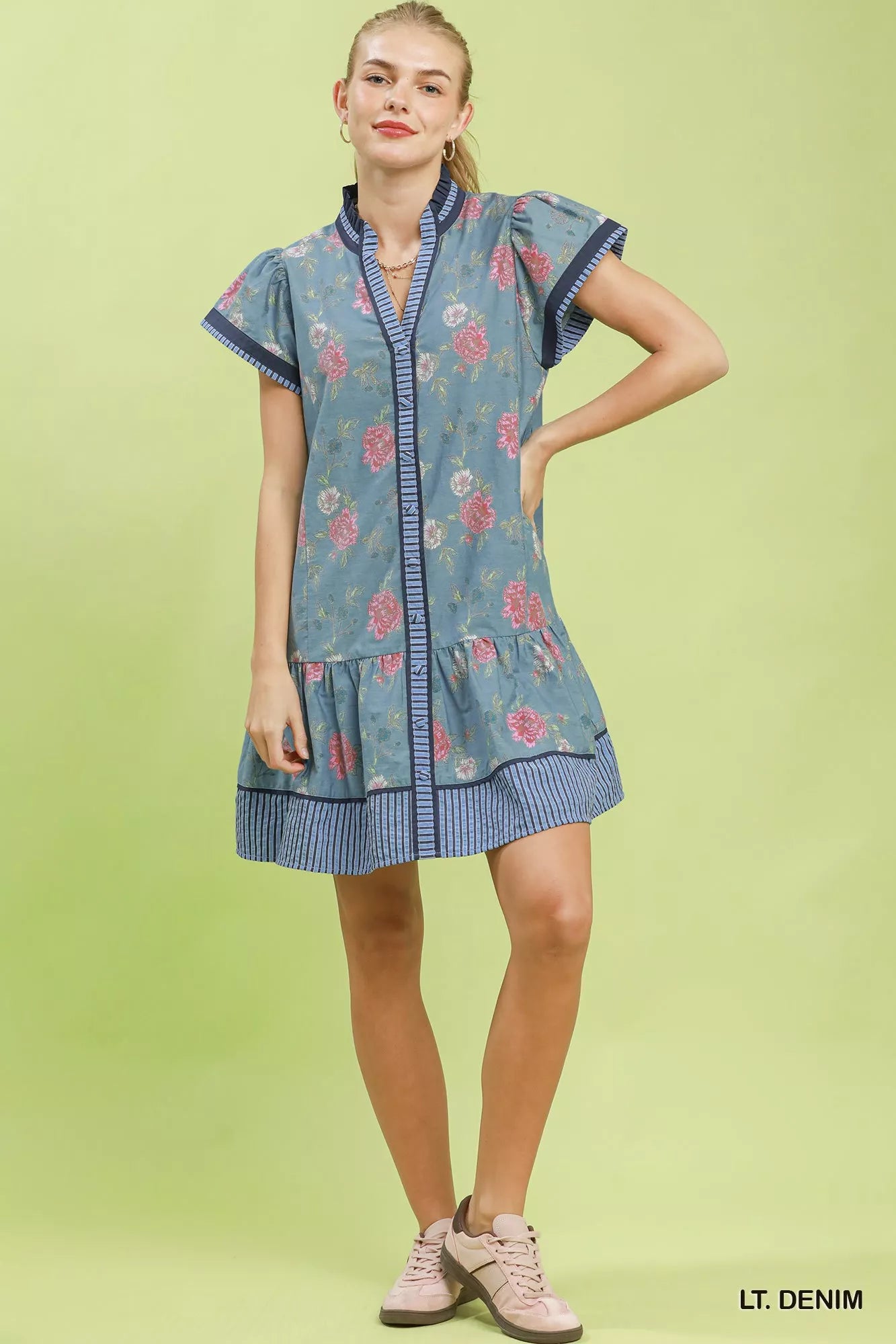 Umgee floral mini dress with contrast trim, ruffle hem, featuring a stylish design perfect for casual or dressy occasions.