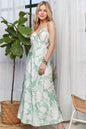 Light green ADORA print spaghetti strap maxi dress by Trendsi, flowing fabric with a stylish summer design.