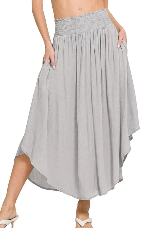 Light grey Zenana woven crinkle maxi skirt with smocked waist and pockets, styled for a casual, comfortable look.