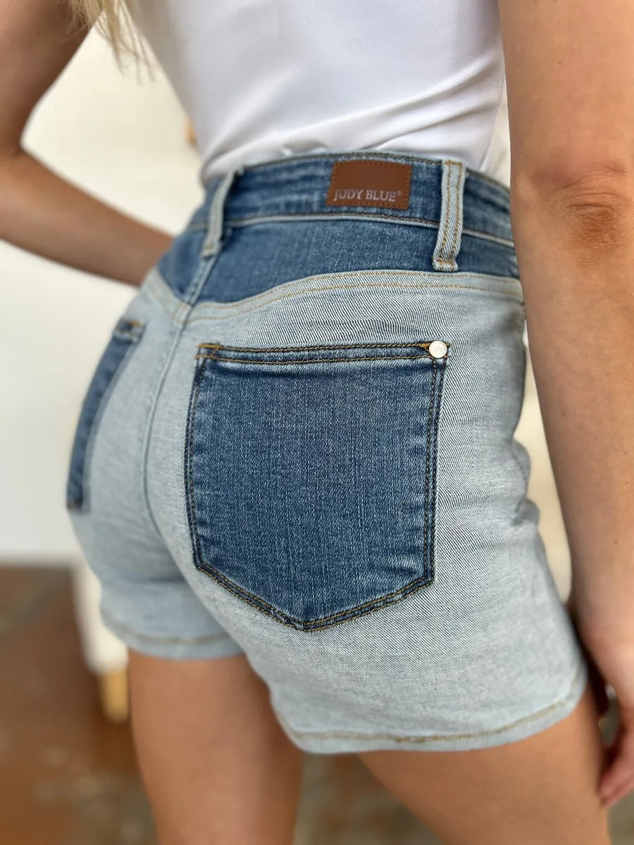 Color block denim shorts by Judy Blue featuring full size, stylish design, and trendy color blocking details.