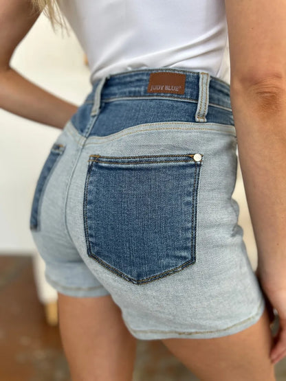 Color block denim shorts by Judy Blue featuring full size, stylish design, and trendy color blocking details.