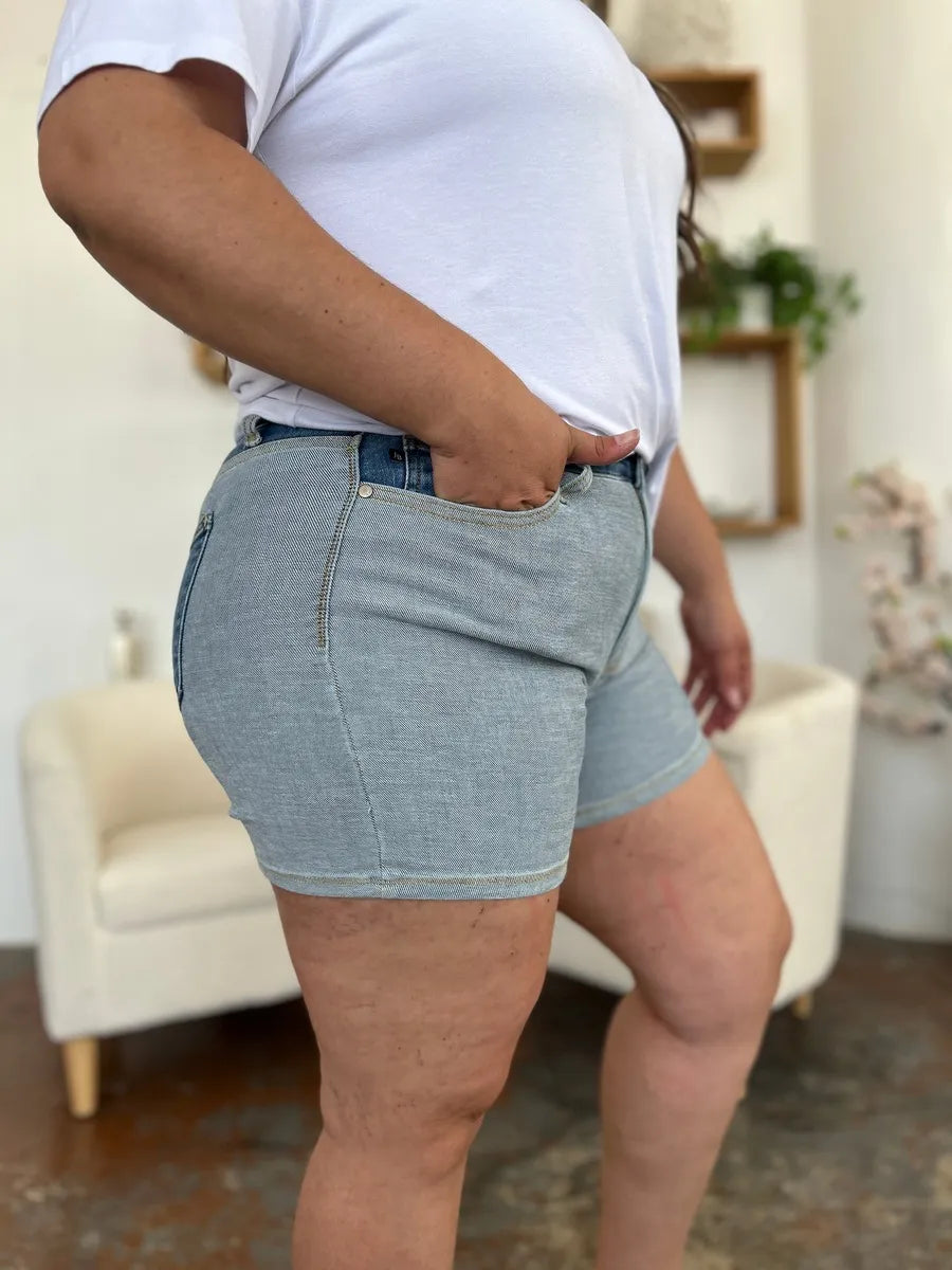 Full size Judy Blue color block denim shorts with a high waist and distressed details, casual style for warm weather.