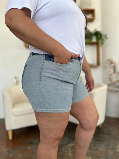 Full size Judy Blue color block denim shorts with a high waist and distressed details, casual style for warm weather.