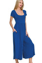 Navy Zenana double-layered short sleeve jumpsuit by Trendsi, featuring a relaxed fit and stylish layered design.