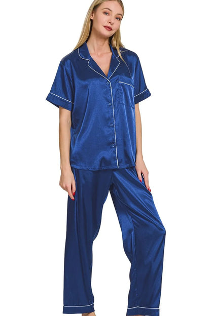 Navy Zenana satin short sleeve pajama top and pants set featuring a relaxed fit and smooth, shiny fabric for comfortable sleepwear.
