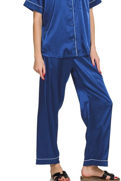 Navy Zenana satin short sleeve top and matching pants pajama set with a relaxed fit, stylish and comfortable sleepwear.