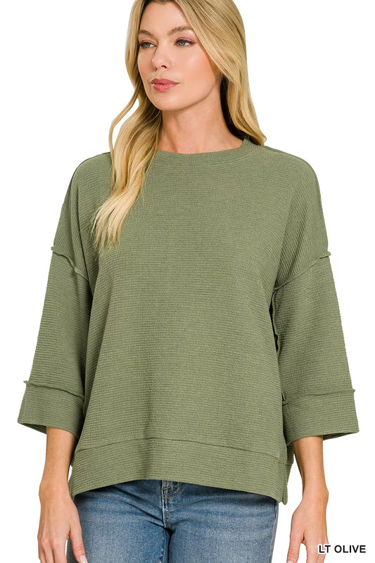 Olive green Zenana double knit 3/4 sleeve top with a relaxed fit, styled on a mannequin.