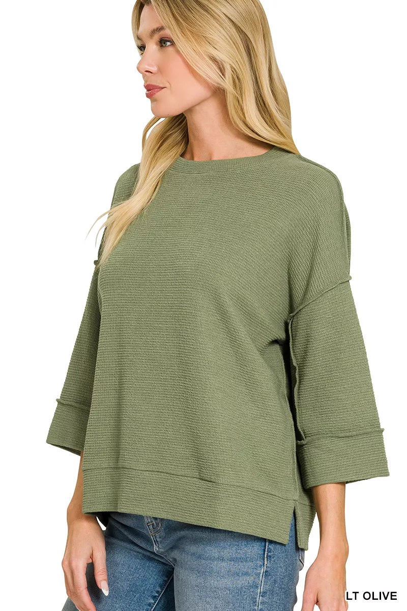 Olive green Zenana double knit 3/4 sleeve top with a relaxed fit, styled for casual wear, from Trendsi.