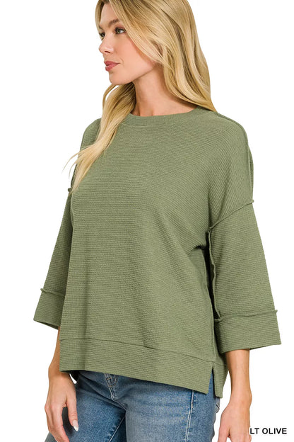 Olive green Zenana double knit 3/4 sleeve top with a relaxed fit, styled for casual wear, from Trendsi.