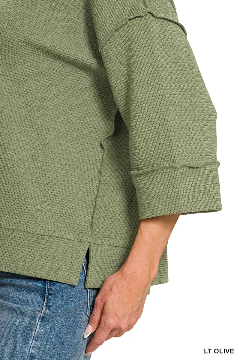 Olive green Zenana double knit 3/4 sleeve top with a relaxed fit, styled on a model for casual wear.