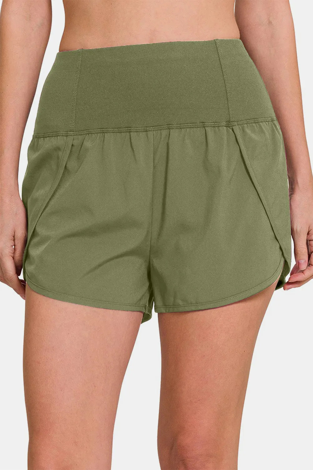 Olive green Zenana high-waisted active shorts with zippered back pocket and comfortable fit, perfect for workouts and casual wear.