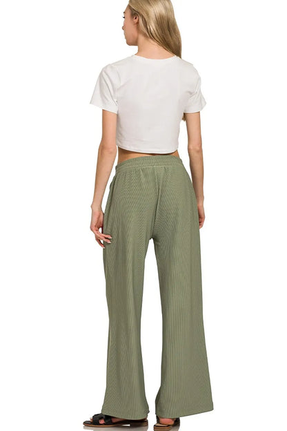 Olive green Zenana ribbed high neck half-zip pullover and matching pants set, stylish loungewear from Trendsi.