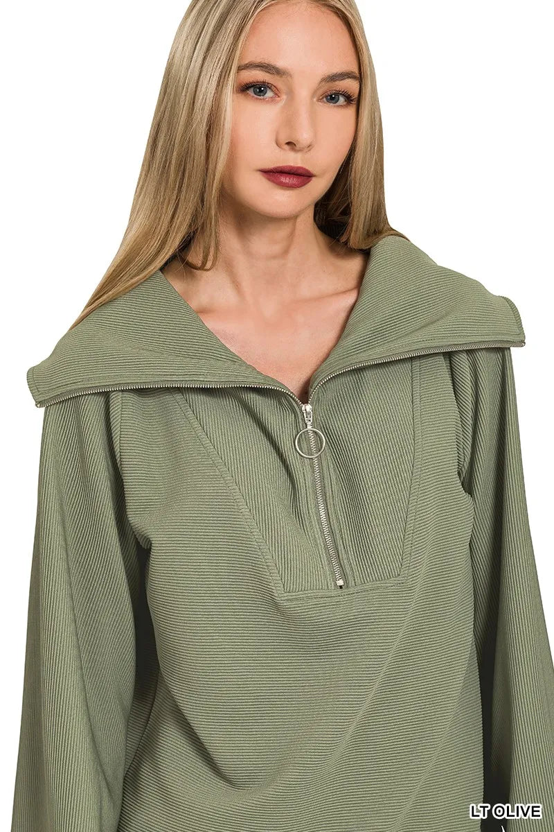 Olive green Zenana ribbed high neck half-zip pullover and pants set by Trendsi, featuring a cozy, fitted knit fabric.