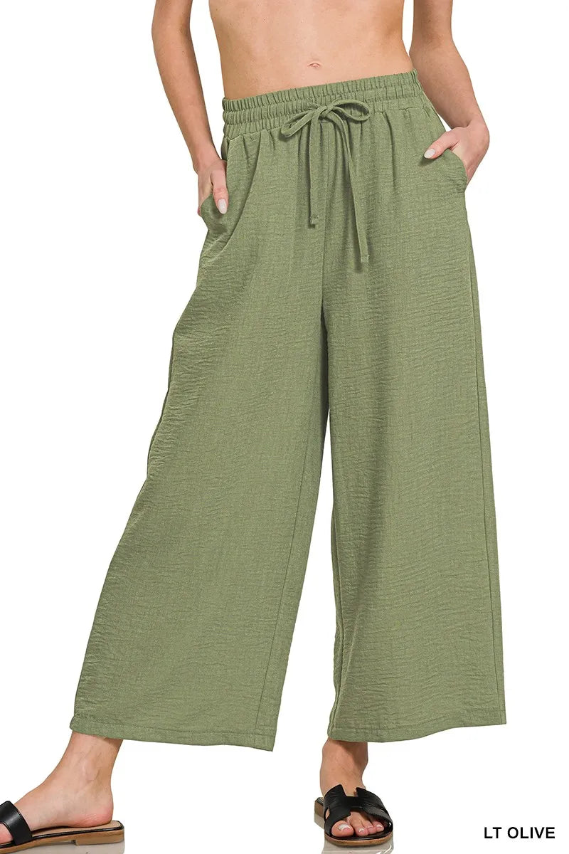 Olive green Zenana woven crepe cropped pants with elastic waistband and band, stylish and comfortable for casual wear.