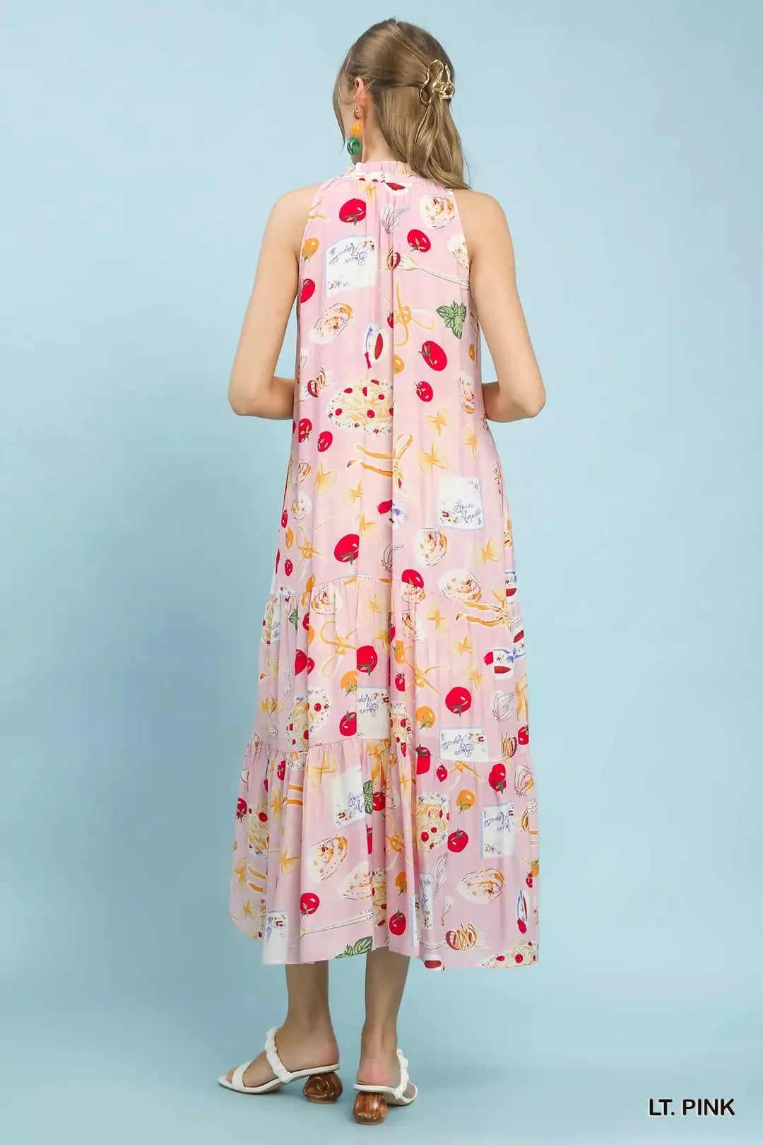 Pink Umgee abstract print tiered halter midi dress with a flowing, layered design and halter neckline.