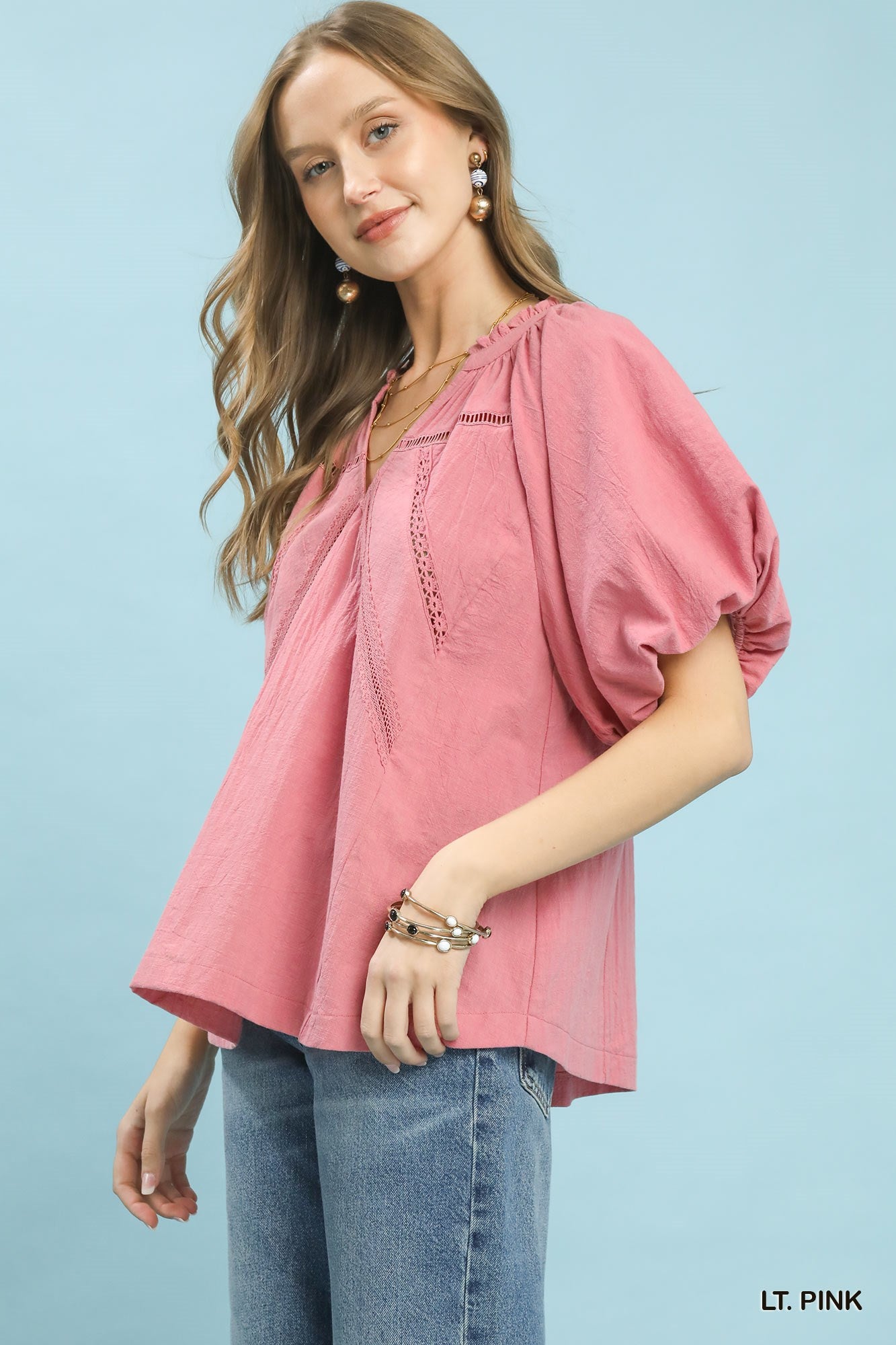 Trendsi Umgee pink lace inset puff sleeve boho blouse with ruffled details and relaxed fit, perfect for casual and bohemian styles.