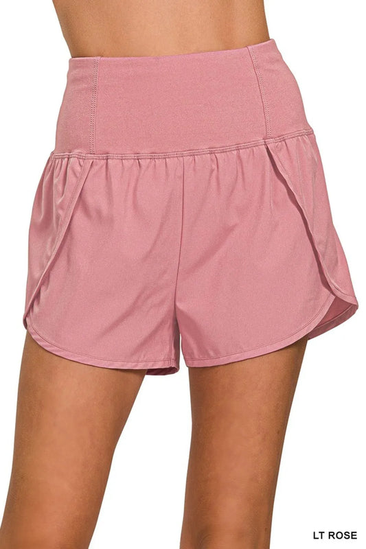 Zenana high-waisted running shorts with zippered back pocket, pink color, lightweight athletic design for active wear.