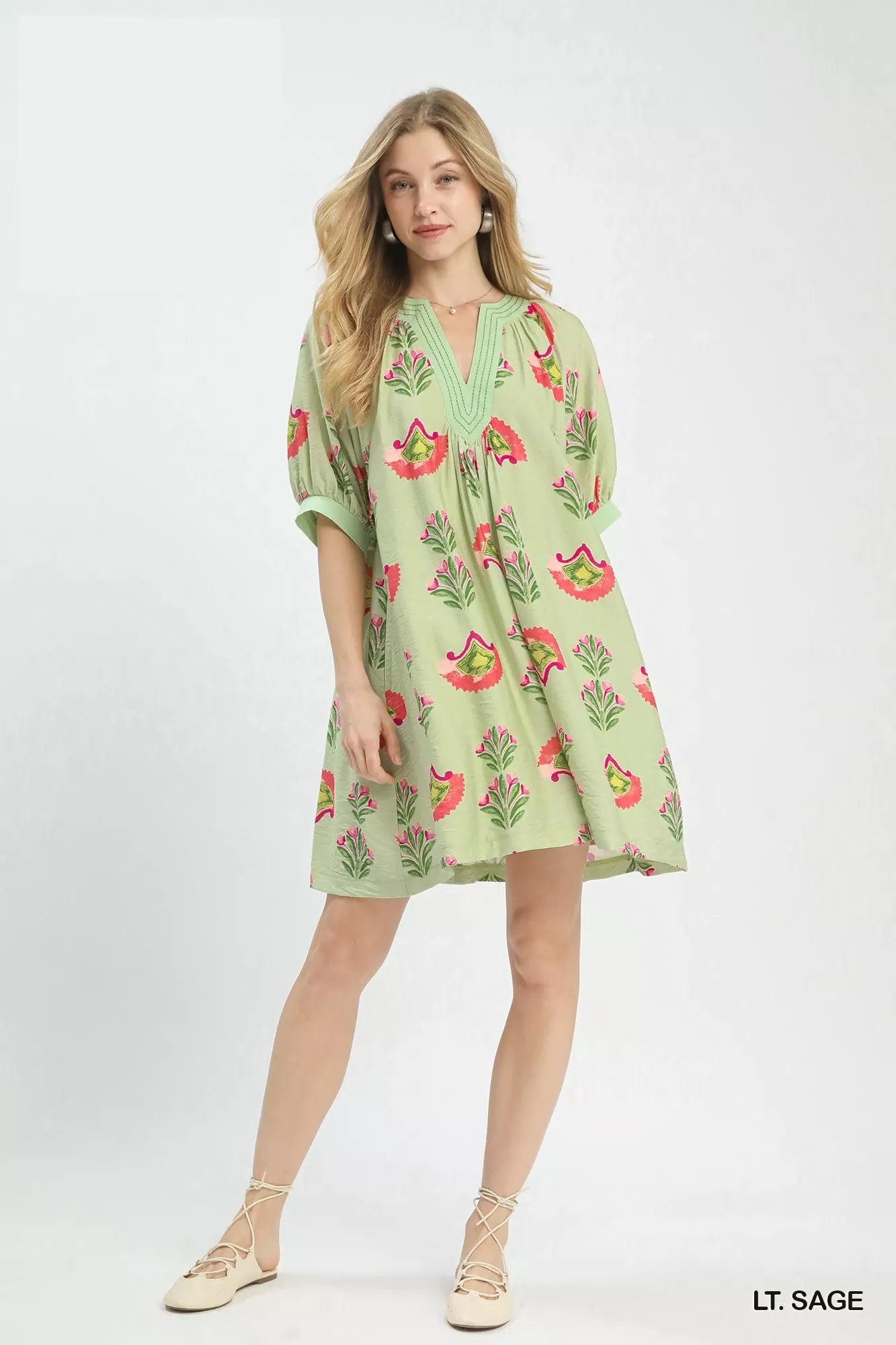 Sage green Umgee abstract print mini dress with short sleeves and flowy silhouette, perfect for casual or summer wear.