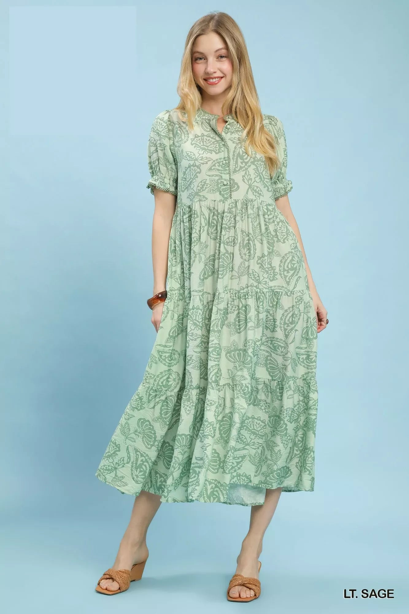 Light sage green Umgee Paisley Print Tiered Midi Dress with flowing fabric and tiered design, perfect for casual or semi-formal wear.