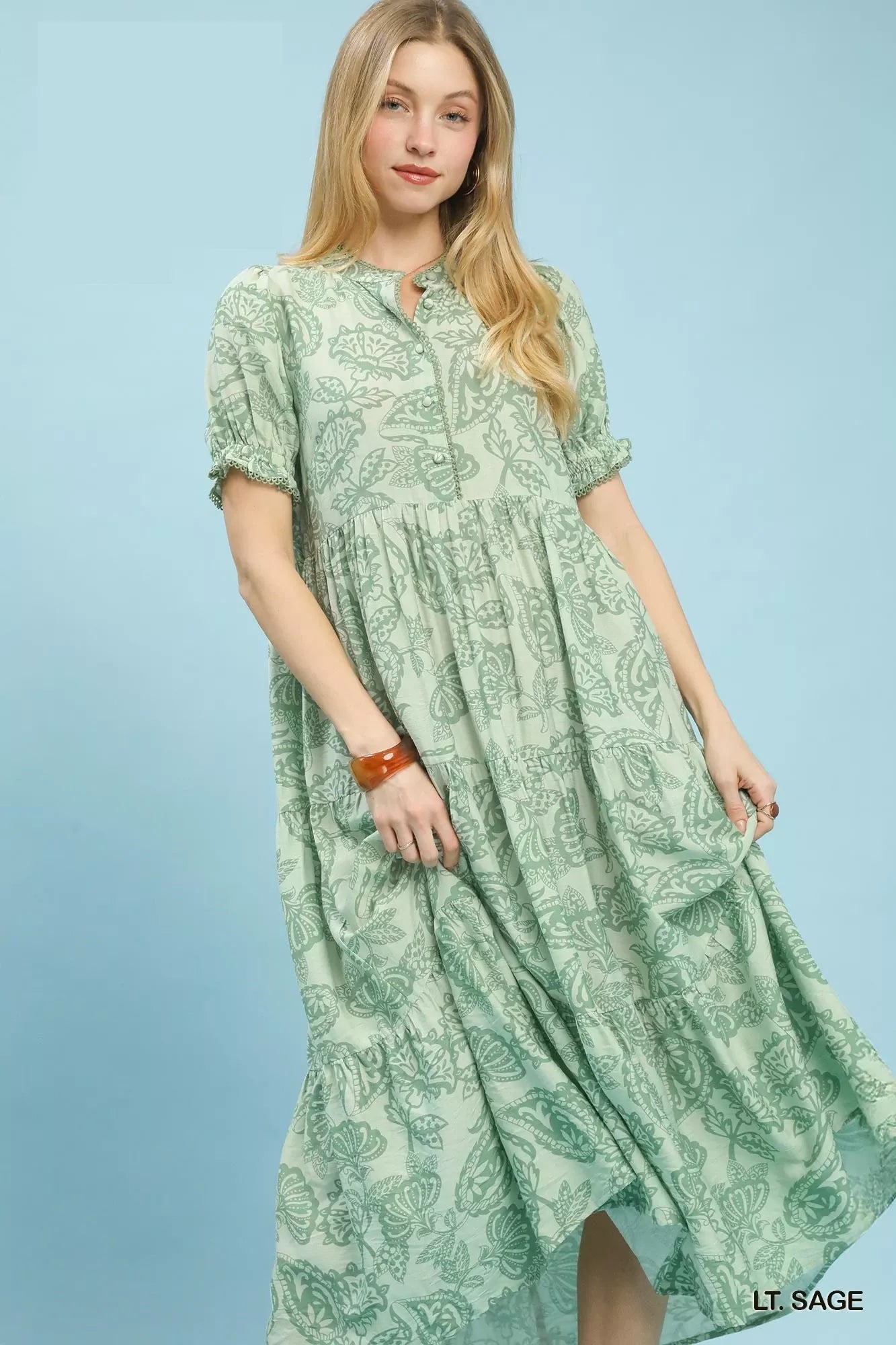 Sage green Umgee paisley print tiered midi dress with flowy fabric and layered design, perfect for casual or semi-formal wear.