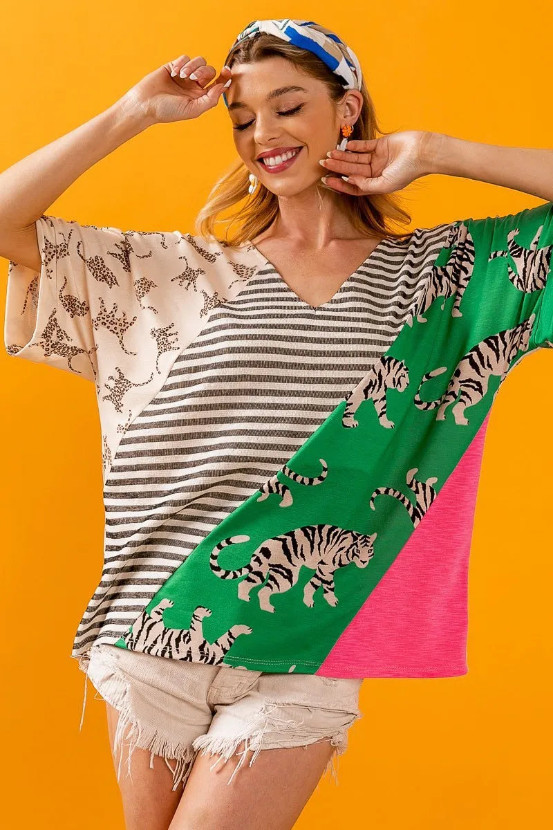Taupe green V-neck top by Trendsi featuring bold stripe contrast color blocks and a relaxed fit.