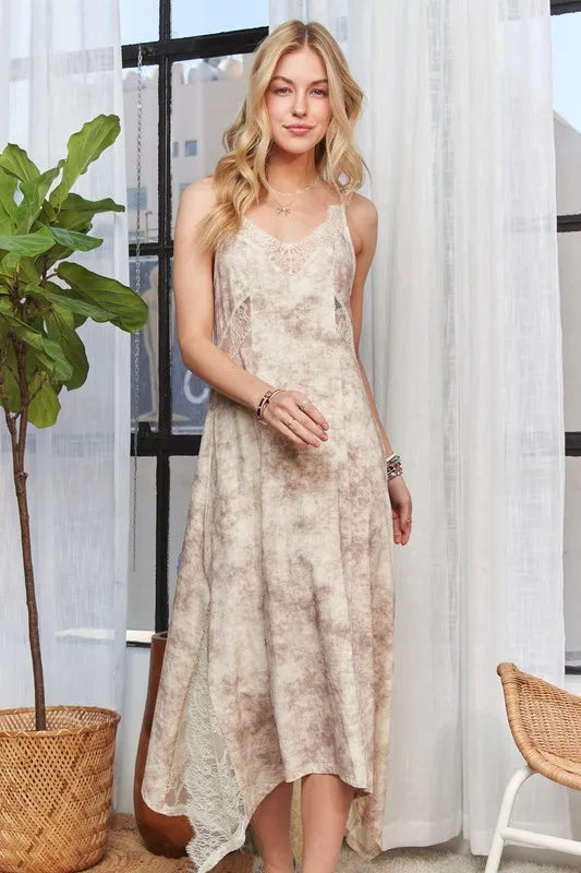 Taupe ADORA printed spaghetti strap midi dress by Trendsi, featuring a flowy silhouette and stylish pattern.